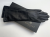 Vermari Milano VWGL-100L - two long black gloves stacked on a box, cuffs on the left side of the frame